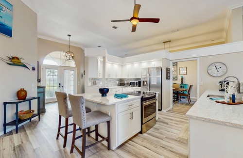 Burnt Store Isles House | Spacious, waterfront home with dock, heated pool, and lanai