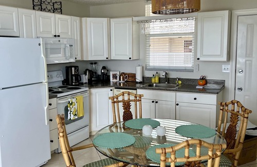 Bonita Springs Condo | Spectacular 9th Floor Views and Sunsets! Steps to the beach. Free in suite WiFi.