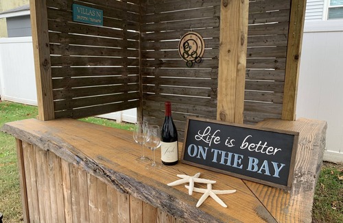 Villas House | Spectacular Sunsets at this Bay Beach Family getaway for Game-lovers