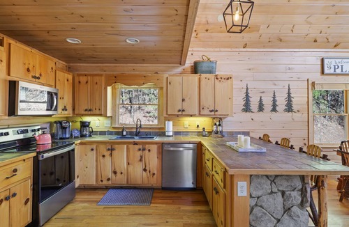 Cherry Log Cabin | Spectacular view, hot tub, 2 fire pits, game room, dog-friendly!