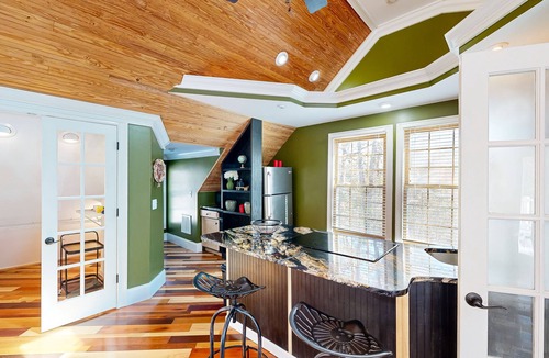 Chester County House | Sprawling property with a pool, hot tub, fireplaces, grill, retro bedroom, & AC