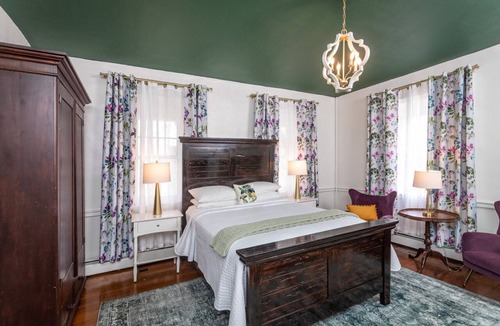 Harrisonburg House | Step Back in Time: Experience Charm and Comfort in Our Iris Room