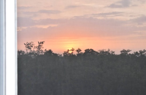 Vanderbilt Beach Apartment | Steps from bluebill beach with stunning sunsets from your balcony.