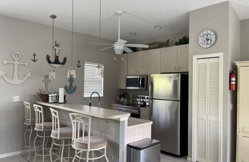 Jose's Hideaway House | Steps from the beach! Spacious island retreat with pool, grill, and space for 12