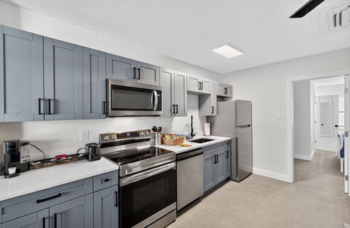 Madeira Beach Condo | 🌅 Steps to Madeira Beach Modern 1BR w/Courtyard & Grill🌴