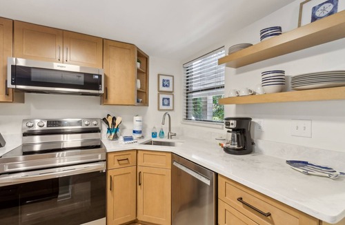 Amelia City Condo | Steps to the Pool | 2 King Beds with Private Patio