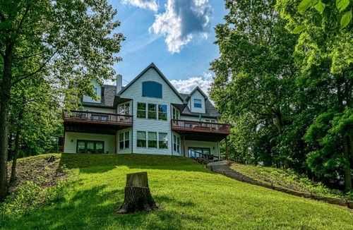 Goodview House | Still Waters - Lakefront luxury home with views, dock, home theater & game room