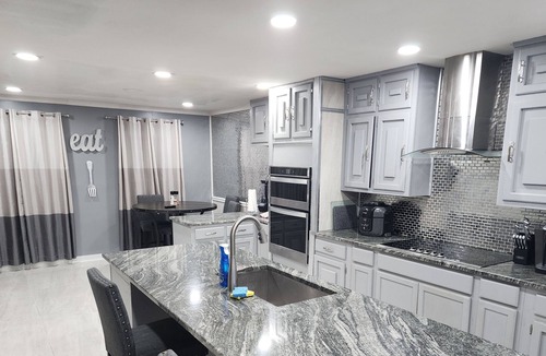 Stone Mountain House | Stunning 4 bed w/ large master and kitchen - 2.5 miles from Stone Mountain Park!