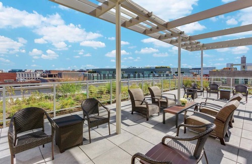 West End House | Stunning City Retreat Steps Away from White House | Rooftop Pool Access
