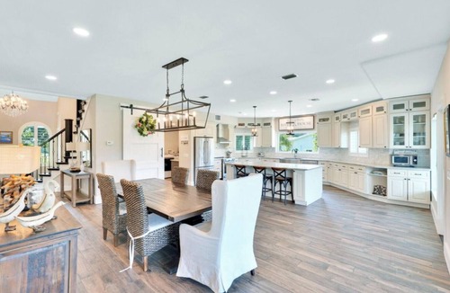 Palm City House | Stunning Water Front River House with Gourmet Kitchen & Large Boat Dock!