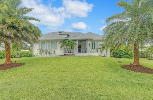 Palm City House | Stunning Water Front River House with Gourmet Kitchen & Large Boat Dock!