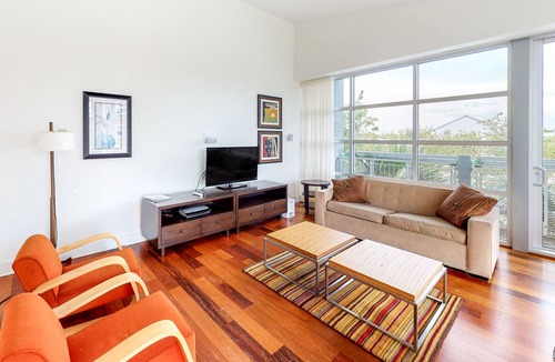 Port St. Joe Condo | Stylish coastal condo w/ shared pool, floor-to-ceiling windows & free WiFi