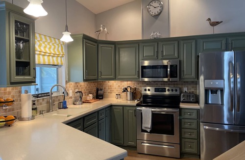 Palm Harbor House | Stylish Family Retreat with Heated Pool, Bikes & More Near Parks & Beaches