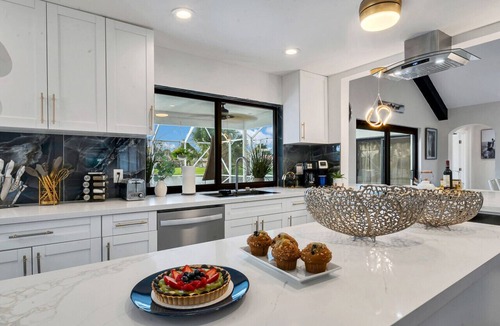 Wellington Villa | Stylish Lake Luxe Equine, on waterfront w screened-in pool - Lake Views! Hosted By Relaxtay