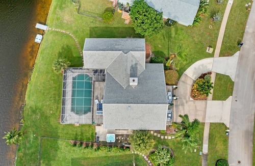 Wellington Villa | Stylish Lake Luxe Equine, on waterfront w screened-in pool - Lake Views! Hosted By Relaxtay