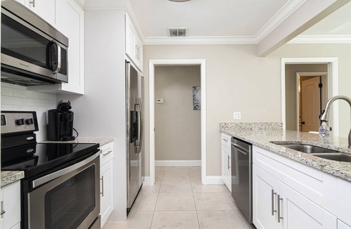 Naples Park House | SUMMER PROMOTION! Cute Designer Home, Heated Pool Oasis, Near Beach, FREE Bikes