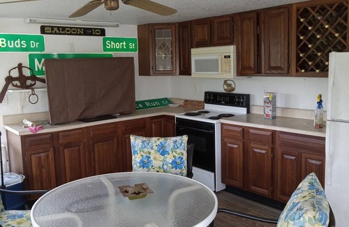 Taylor Creek House | Summer Special 60 off! 3 bed, 2 bath on water, boat house, pontoon available
