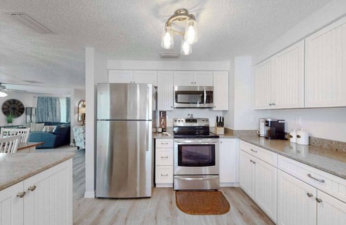 Cortez House | Sunny canal front home with a pool & dock - central location and dogs ok