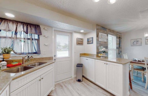 Cortez House | Sunny canal front home with a pool & dock - central location and dogs ok