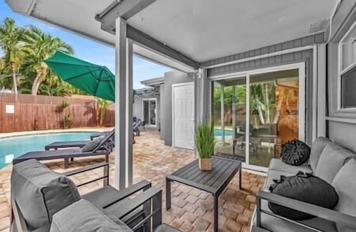 Middle River Terrace House | Sunny Days Getaway, 5BD Heated Pool Family Home!