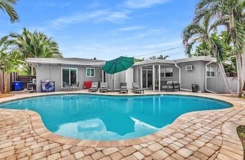 Middle River Terrace House | Sunny Days Getaway, 5BD Heated Pool Family Home!