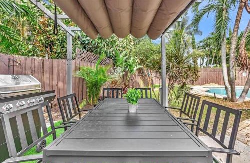Middle River Terrace House | Sunny Days Getaway, 5BD Heated Pool Family Home!