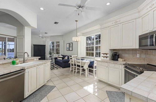 Port Charlotte House | Sunny South-Facing Salt & Heated Pool Spa on FISHING Lake FallWinter 25-26 Avail