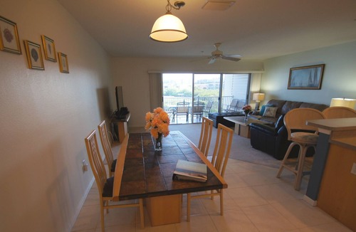 Indian Shores Condo | Sunrises and sunsets – finely appointed direct waterfront - steps from the beach