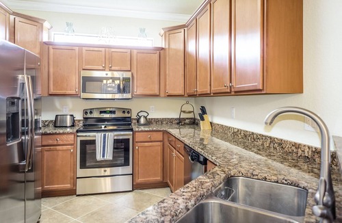 Gran Paradiso Villa | Sunset/water views. Luxurious resort community. Clean! Beautifully decorated!