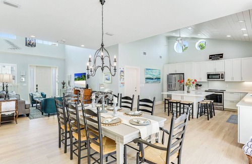 Holmes Beach House | Surfside AMI; backyard oasis steps to beach, heated pool, putting green,+gear!