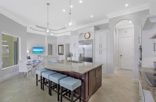 Marco Island House | SW exposure home on wide canal with pool and spa