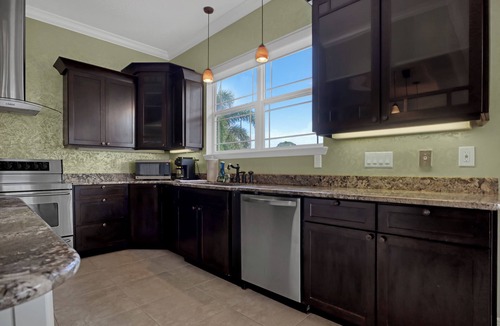 Tropic House | Sweeping Views, Direct Riverfront, Dock, Heated Pool, 8bed/5.5bath Sleeps 18