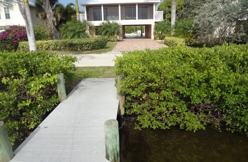 Bokeelia Villa | The Bokeelia Boathouse, waterfront, Boat Dock, Pine Island, Florida
