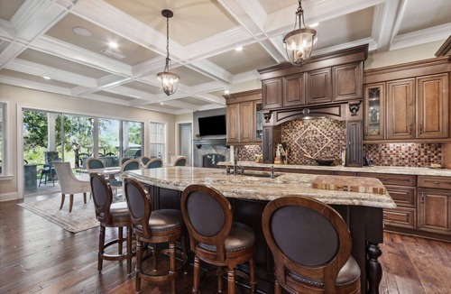 Yulee House | The Castle: Riverfront, Pool, hot tub, Full outdoor kitchen, deep water doc, gas fire pit & more!