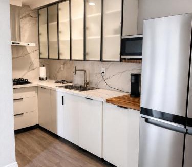 Buena Ventura Lakes Apartment | The Ember Suite l Designer Guest House