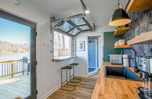 Easley Apartment | The Hive · Luxe Shipping Container w/King on Lakefront Farm