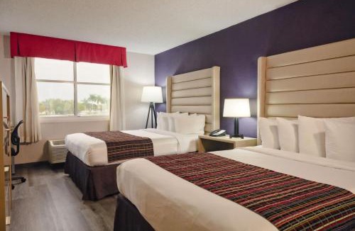 Ludlam Hotel | The Palms Inn & Suites Miami, Kendall, FL