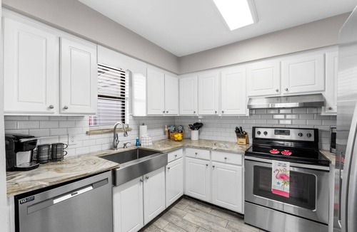 Holiday Beach House | The Pink Flamingo by Book That Condo