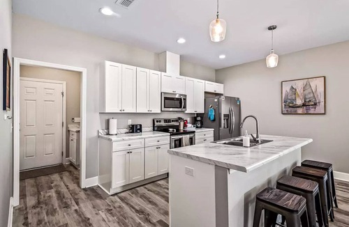 Carrabelle House | The Seabreeze Retreat with community pool