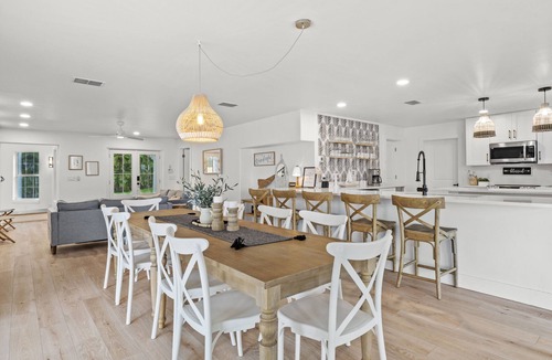 Biggar House | The Sunset Escape: Riverfront Elegance with Pool