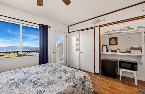 Cedar Key Condo | The water is so close, you'll think you're on a house boat!