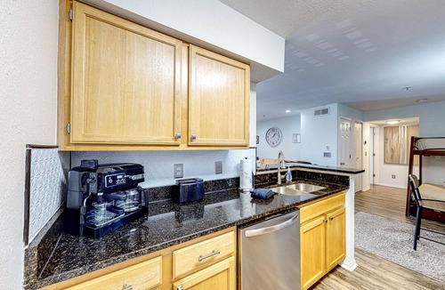 Indian Bayou Condo | Third-floor condo with balcony, pool, gym & central AC - 1/2 mile to the beach