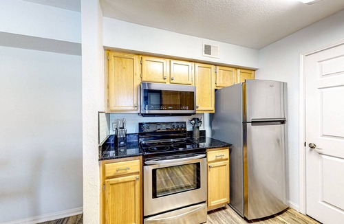 Indian Bayou Condo | Third-floor condo with balcony, pool, gym & central AC - 1/2 mile to the beach