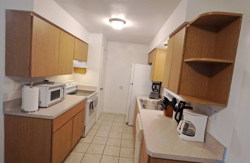 Port Malabar House | This cozy house is family and pet friendly.