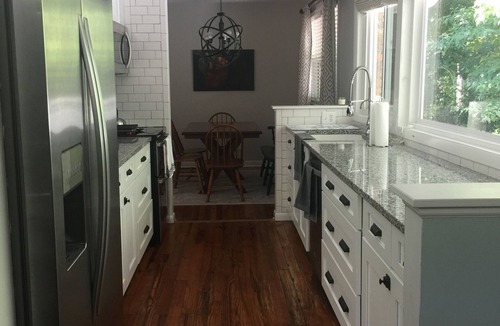 Forest Hills House | This updated brick home is ready for the Masters! Just a 5-min Uber ride.