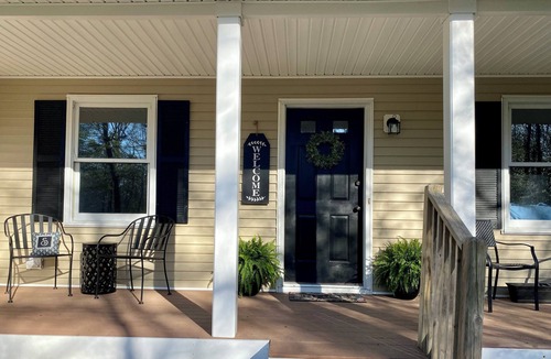 Clermont House | Three bedroom home in beautiful treelined neighborhood.