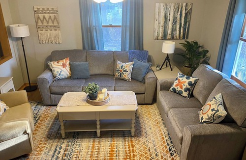 Clermont House | Three bedroom home in beautiful treelined neighborhood.