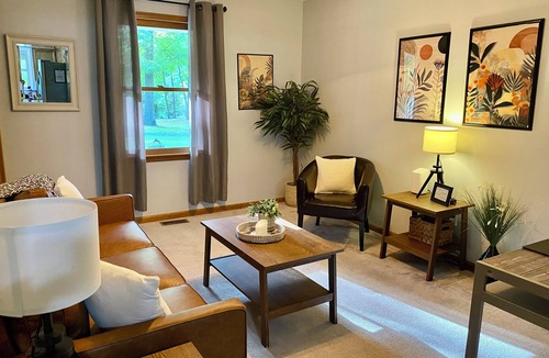 Clermont House | Three bedroom home in beautiful treelined neighborhood.