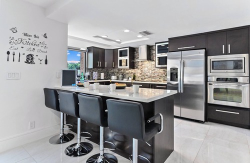 Boca Pointe House | Tiki Escape: Heated Pool & Luxe King Suite