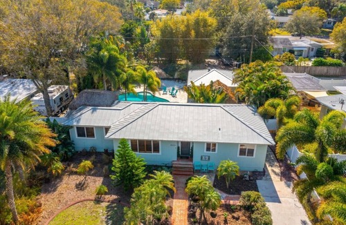 St. Petersburg House | Tiki it Easy - Luxury Home Minutes to Beach!